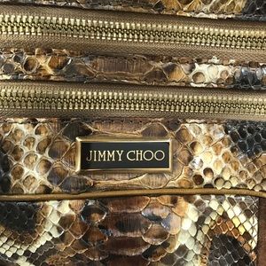 Rare PYTHON bag w/suede. Comes w/sleeper bag. No stains. No significant wear